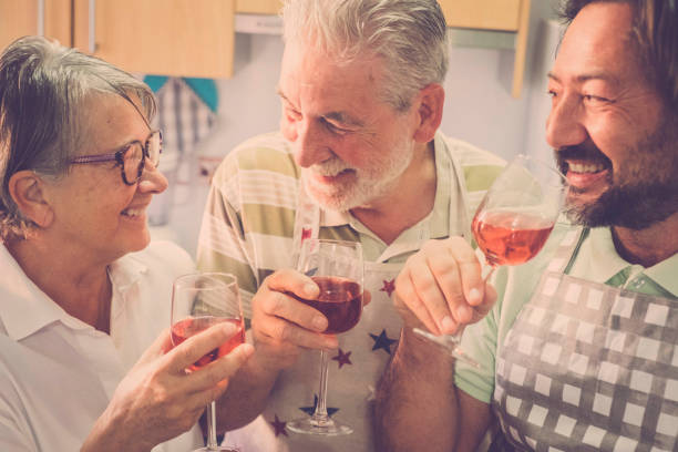 aged family at home with wine