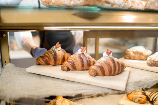 istock Croissant on the store showcase 936401982