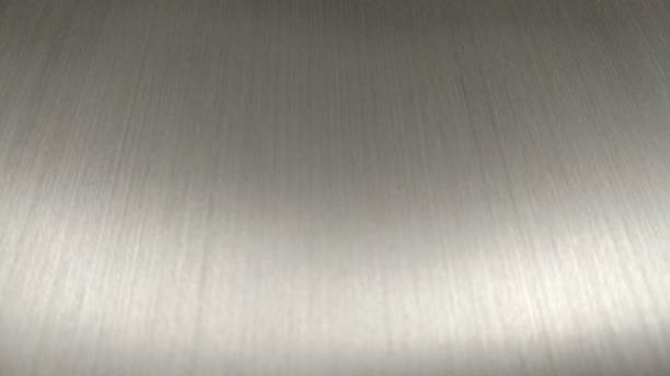 istock brushed metal texture ; abstract industrial background 936404636
