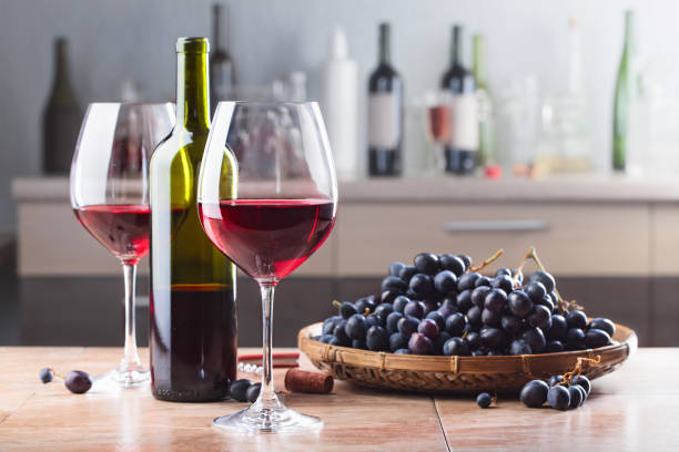 istock Bottle and glasses of red wine . 936404928