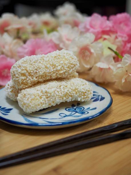 istock Korean traditional sweets yugwa and Green tea and cherry blossoms 936406830