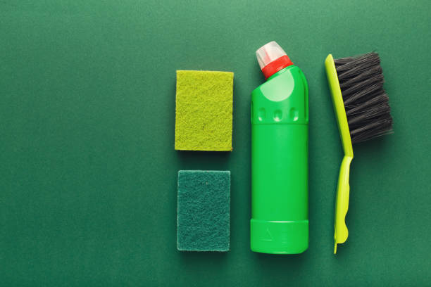 istock Various cleaning supplies, housekeeping background 936411104
