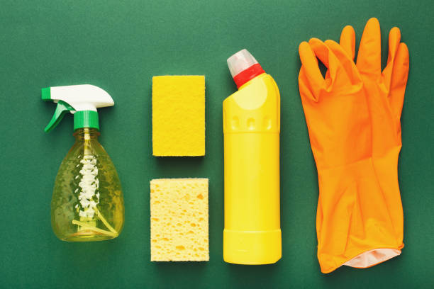istock Various cleaning supplies, housekeeping background 936411144