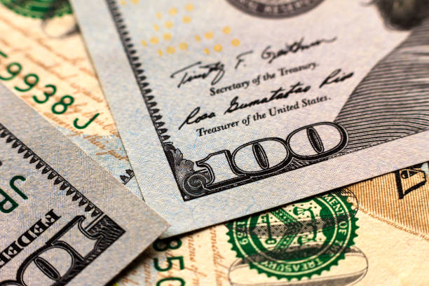 istock US one hundred dollar bills money background 936415296