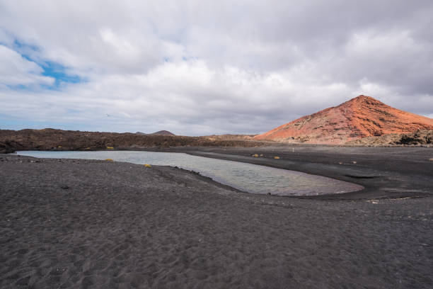 istock Volcanic crater (Montana Bermeja) in Lanzarote, Canary islands, Spain. 936416894