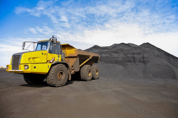 istock Mining Rock Dump Truck for transporting Manganese ore rock 936417948