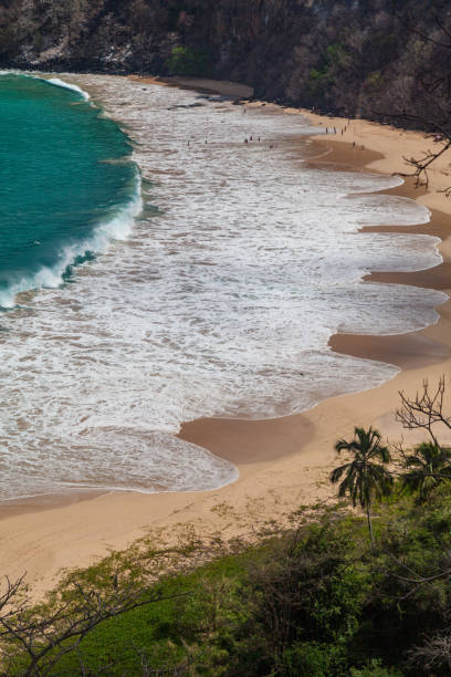 istock Sancho Bay Fernando de Noronha Brazil 936418718