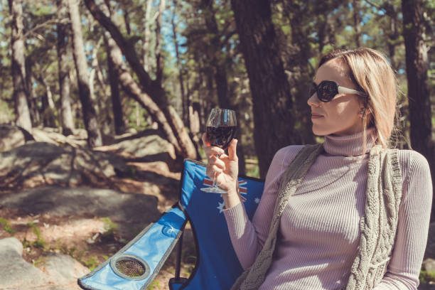 Woman holding a glass of wine