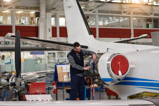 istock Aircraft mechanic in the hangar 936426156