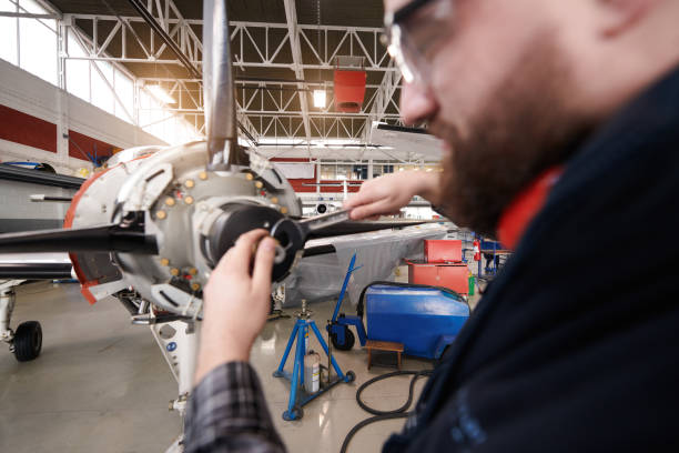 istock Aircraft mechanic in the hangar 936426230