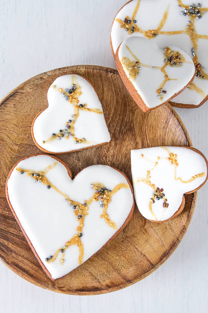 istock Honey gingercakes in the form of heart. Valentine's Day. Light background. 936434096