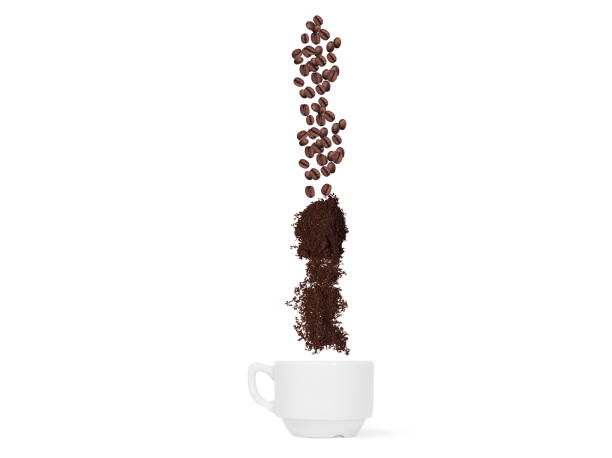 istock Coffee beans and ground coffee fall into the cup. ConceptCoffee beans and ground coffee fall into the cup. 936435650