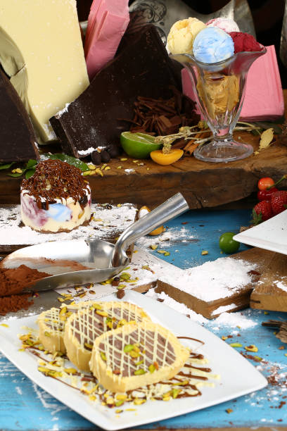istock Table with various cookies, tarts, cakes, cupcakes and cakepops 936436496