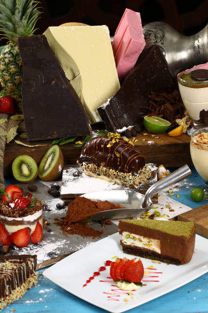 istock Table with various cookies, tarts, cakes, cupcakes and cakepops 936436524