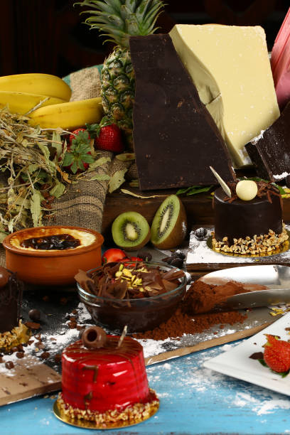 istock Table with various cookies, tarts, cakes, cupcakes and cakepops 936437304