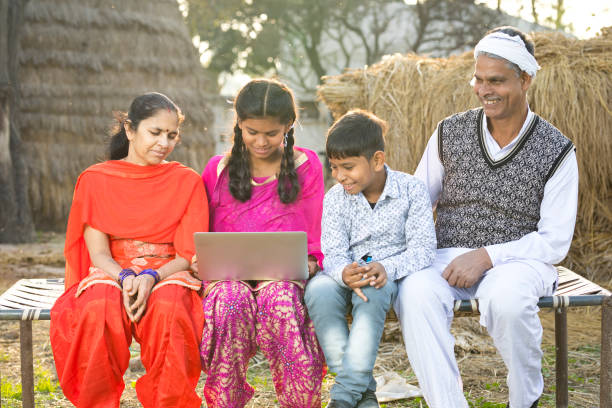 istock Family with girl using laptop 936439016