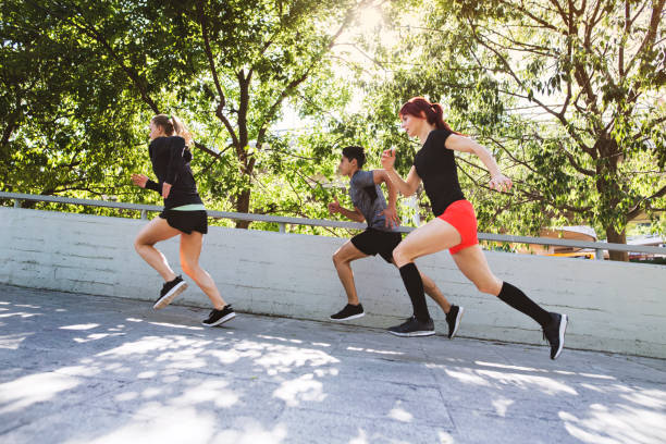 istock Young athtletes running in the city. 936441114