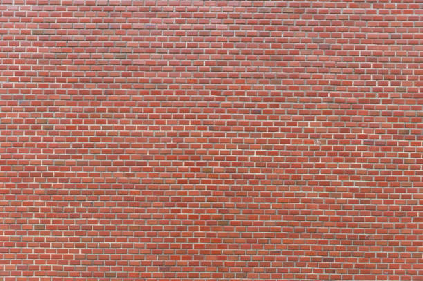 mur de carreaux de brique en céramique, mur de briques sans soudure - seamless brick repetition pattern photos et images de collection