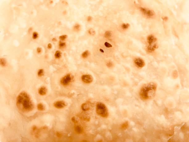 istock Close Up of Chapati Roti, Paratha or Flatbread 936449150