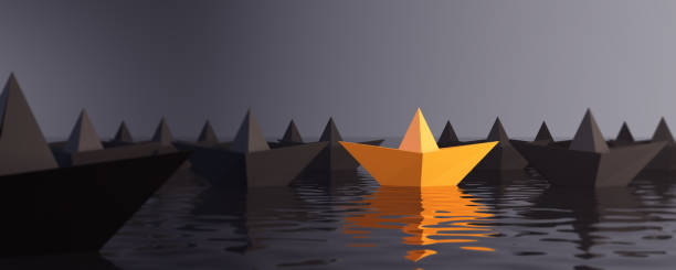 istock Standing Out From The Crowd With Paper Boats 936463750
