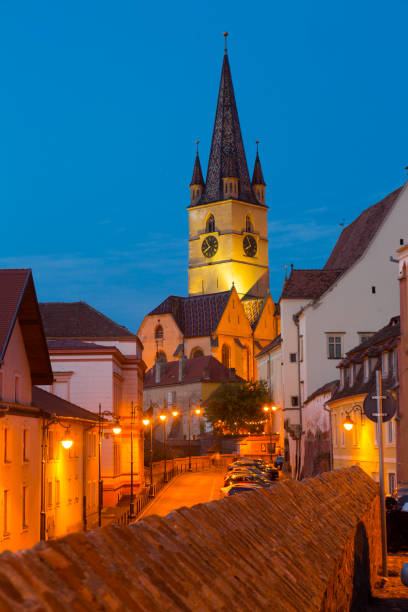 istock Image of Cathedral on night strrets of Sibiu 936465928