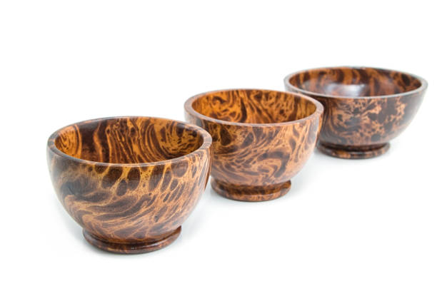 istock Empty wooden bowl isolated on white background 936470358