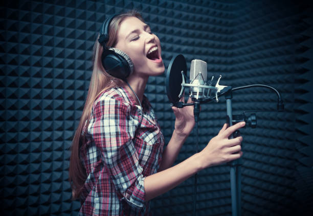 istock Woman in a recording studio 936474198
