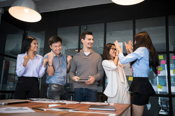 istock Business team analyzing income charts and graphs 936478936