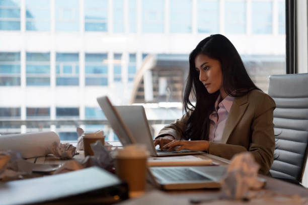 istock Young business woman is boring. 936481010
