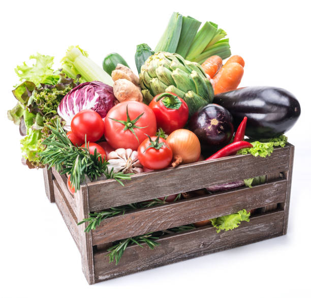 istock Fresh multi-colored vegetables in wooden crate. 936488620