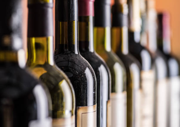 istock Line of wine bottles. 936491558