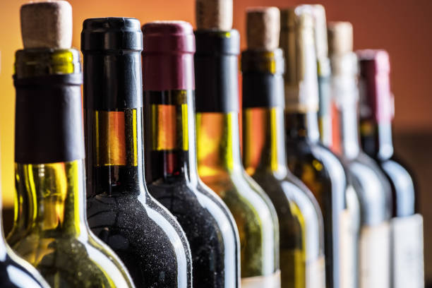 istock Line of wine bottles. 936491618