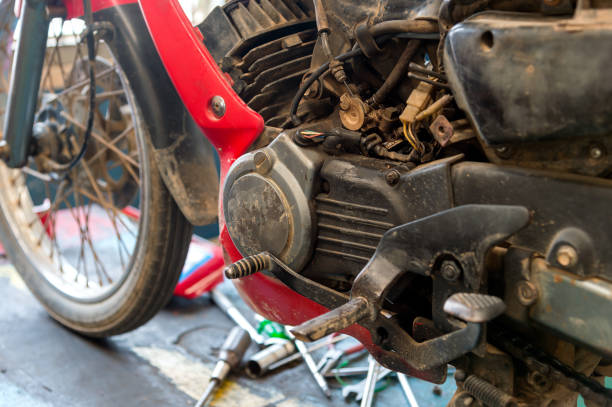 istock old motorcycle engine repair with soft-focus and over light in the background 936492014