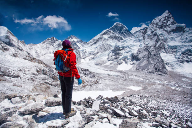 istock Woman looking at view on Himalayas 936492670