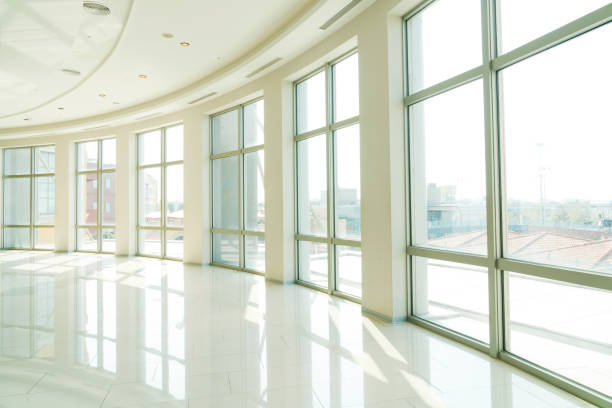 istock Modern glass wall of office building 936492890