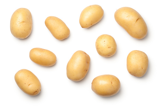 Potatoes isolated on white background. Flat lay. Top view