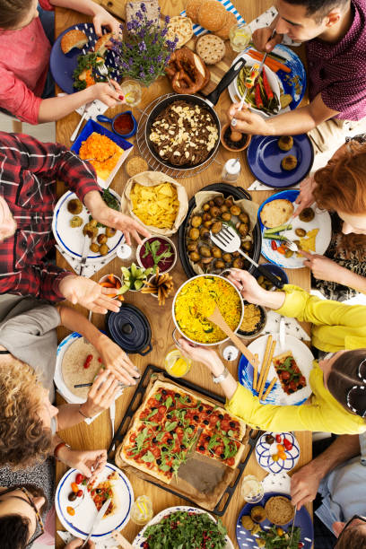 istock Group of friends in restaurant 936499720
