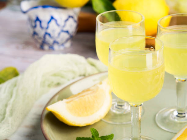 istock Home made limoncello in stemmed glasses 936499976