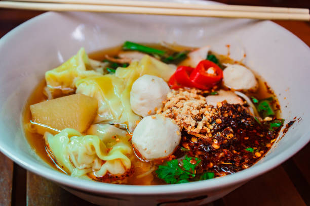 istock Noodle and dumpling with barbecued red pork. 936499980