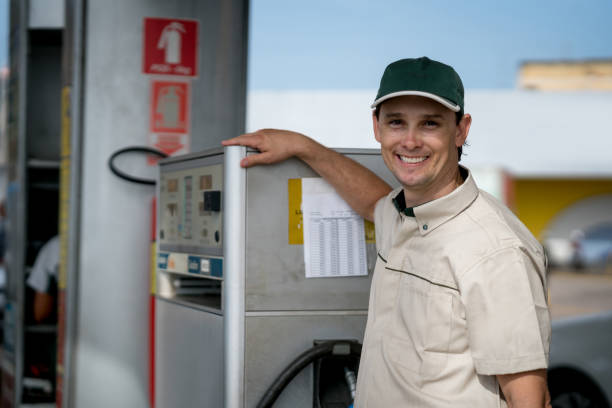 istock Happy service man working at a gas station 936501384
