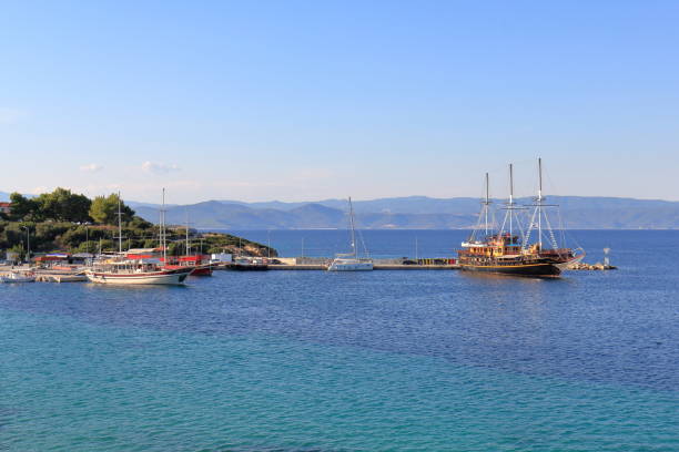 istock Sailships in Ormos Panagias Port 936501552