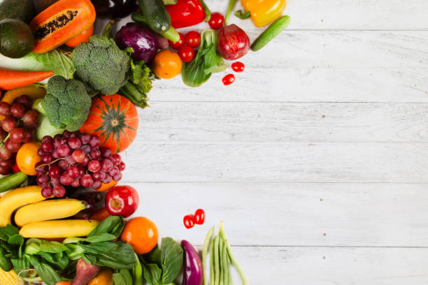 istock Vegetable and fruits on white wood background, Flat lay 936505934