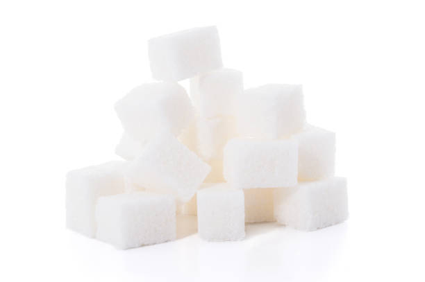 istock Group of white sugar cubes isolated on white background 936516430