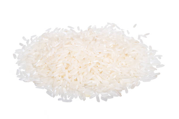 istock Heap of white rice isolated on white background 936516432