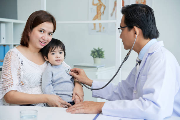 istock Doctor Consulting Little Patient 936516638