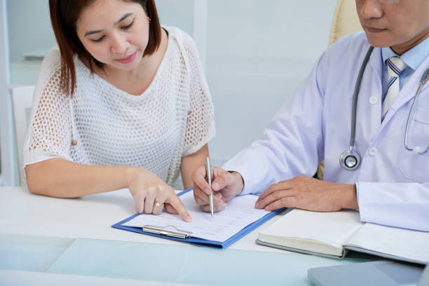 istock Pretty Patient at Physician Office 936516668