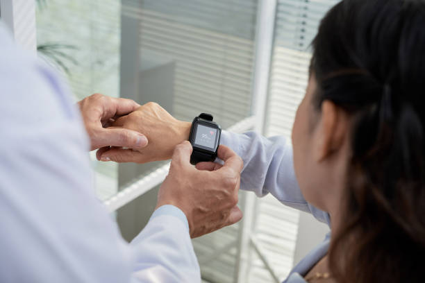 istock Checking Heart Rate with Smartwatch 936516870