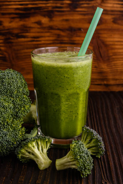 istock fresh broccoli juice on a wooden background 936526626