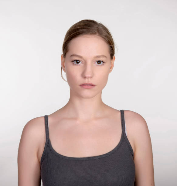 istock pensive young blond woman 936529030