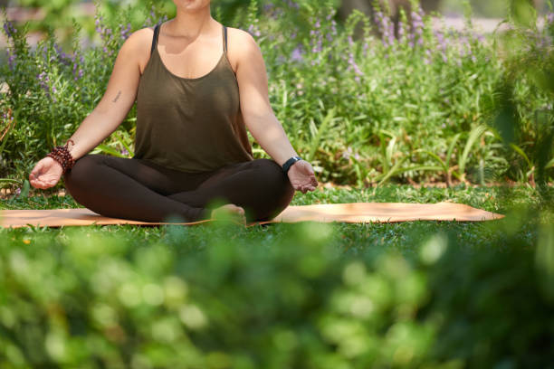 istock Practicing Yoga Outdoors 936532558